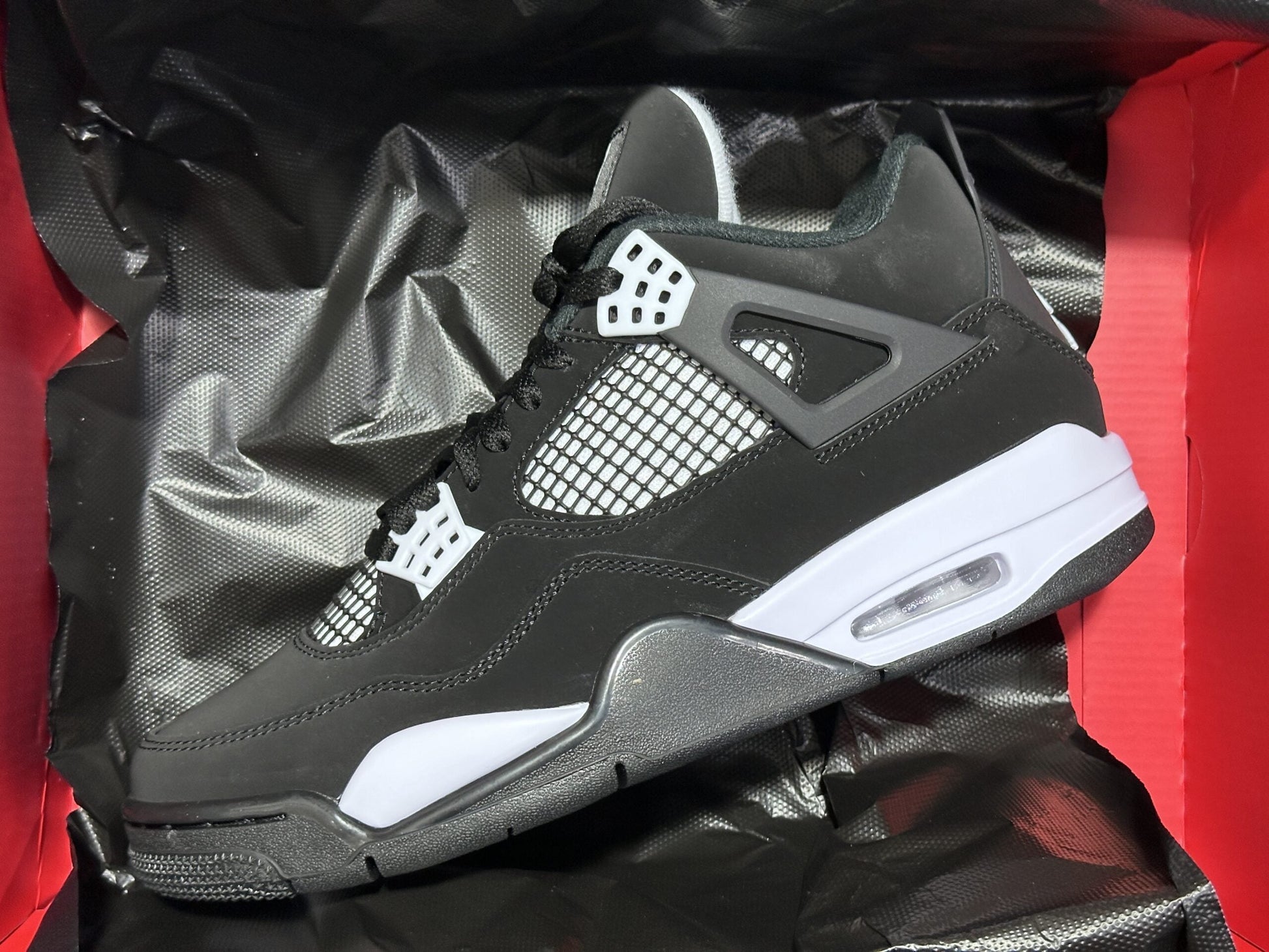 Jordan 4 Bianche e Nere